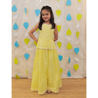 Young girl in a yellow sharara.